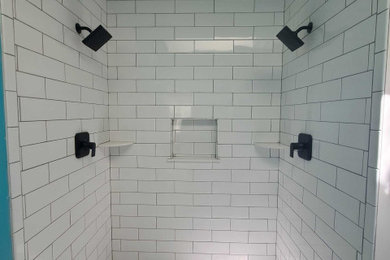 Example of a mid-sized minimalist master white tile and subway tile mosaic tile floor and gray floor bathroom design in Philadelphia with a niche