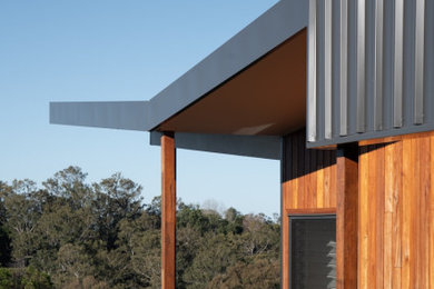 Design ideas for a contemporary home design in Sunshine Coast.