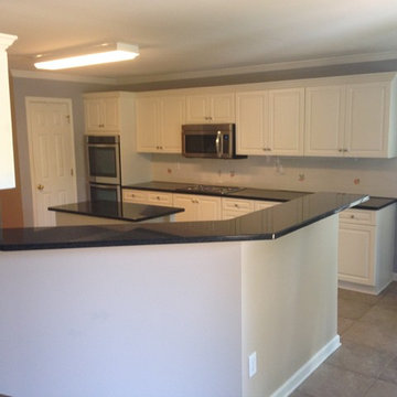 Updating White "Builder Grade" Kitchen Cabinets