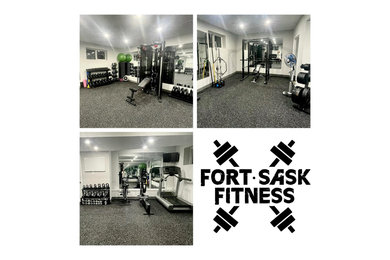 Inspiration for a small modern black floor home weight room remodel in Edmonton