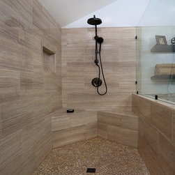 Walk in shower with two corner benches and White Oak Pebbles floor - Products
