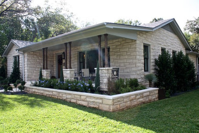 Example of a transitional exterior home design in Austin