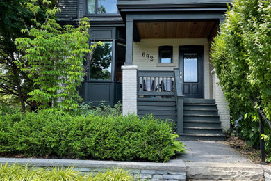 Transitional exterior home idea in Toronto