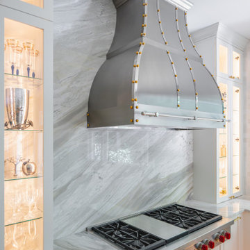 Transitional Kitchen Remodel with Quartzite Island and Brass Details