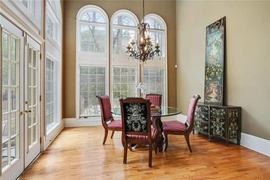 Example of a classic dining room design in Atlanta
