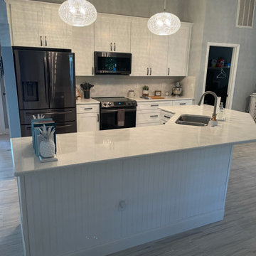Modern Kitchen and Bath Remodel Done in Polar White