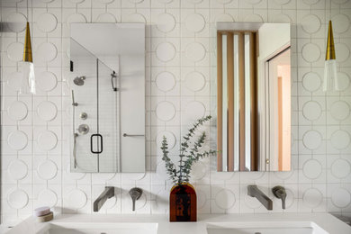 Bathroom - 1960s ceramic tile double-sink bathroom idea in Portland with white countertops
