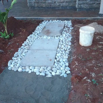 Concrete and pebble footpath