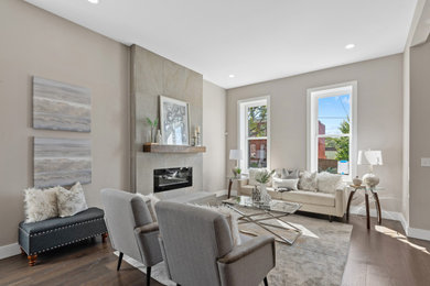 Large transitional open concept dark wood floor, brown floor and vaulted ceiling living room photo in St Louis with a standard fireplace, a stone fireplace and a media wall
