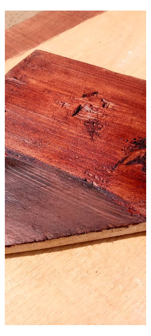 Brown stain turning red after varnish?