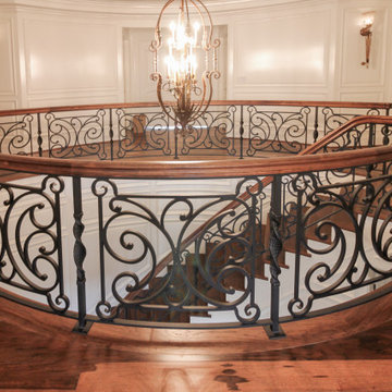 Project #74 | Circular Staircase with Hand-Forged Metal Panels