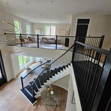 Project #130 | Curved Staircase with Wraparound Balcony