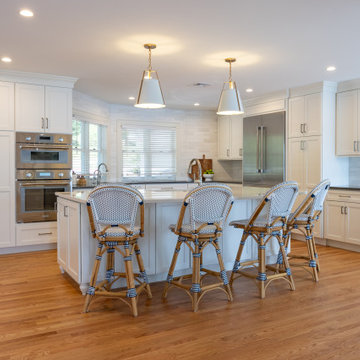 Bright Kitchen with Large Island and Coastal Bistro Seating