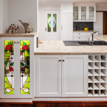 Traditional kitchen with gorgeous stained glass feature