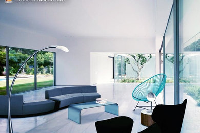Living room - modern open concept living room idea in Denver with white walls