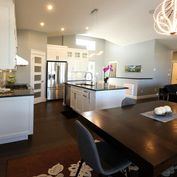 All White Kitchen with Dark Counter Tops