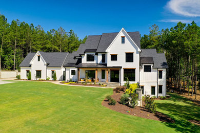 Example of a large country exterior home design in Atlanta