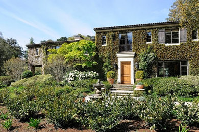 Huge mediterranean beige two-story exterior home idea in San Francisco