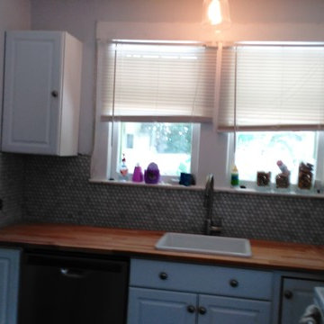 Total Kitchen Remodel, Tile floor, cabinet, backsplash, counter tops, appliances