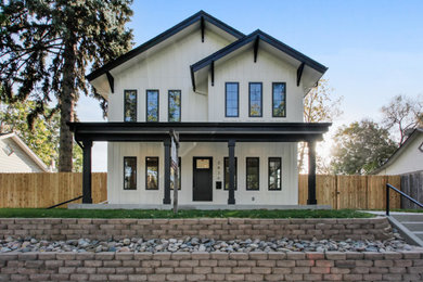 Example of a cottage exterior home design in Denver