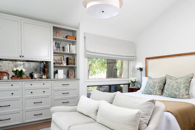 Photo of a large transitional master bedroom in Santa Barbara with white walls.