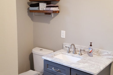 Example of a farmhouse basement design in Atlanta