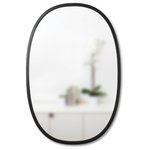 Umbra - Umbra Hub Modern Wall Mount Oval Mirror Black - The Umbra Hub Wall-Mounted Oval Mirror offers a fresh take on a classic design. A black oval frame surrounds the pane of glass, offering a clean and contemporary look that blends seamlessly with a range of interior styles.