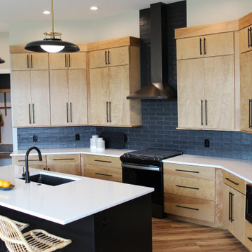 Angled Kitchen Design with Slab Style Cabinets in Pecan Stain