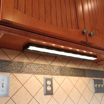 Rustic Maple Kitchen with Custom Made Cabinet Doors and Granite Counters