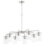 Maxim - Sleek Eight Light Chandelier - Cylinders in Clear Seeded glass on simple Satin Nickel frames or matte Black frames with Antiqued Brass socket covers. Pivoting arms on chandelier allow it to direct light up or down. Use filament lamps either tubular or Edison in shape for a Coastal or Industrial look or use a traditional A19 to create a more transitional look. A full range of affordable lighting for the kitchen dining room bathroom or bedroom that easily complements fashionable finishes and lasting styles.