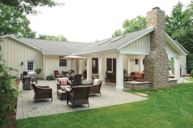 Design ideas for an expansive country backyard full sun garden in Columbus with concrete pavers.