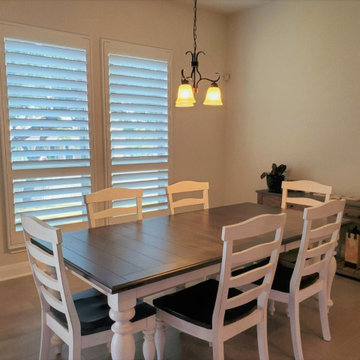 Polycore Shutters with hidden tilt and divider rail.