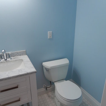 Basement Reno with Full Underpin, 8' Ceilings and Partial Flush Beam