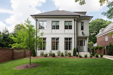 Large elegant home design photo in Charlotte