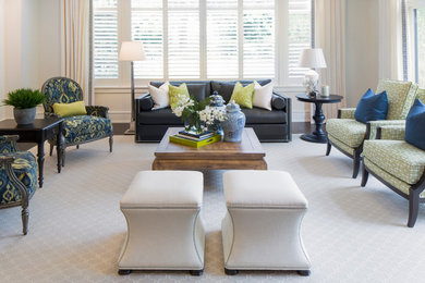 Living room - large transitional open concept dark wood floor living room idea in Phoenix with white walls, a two-sided fireplace, a stone fireplace and a wall-mounted tv