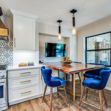 Built in eating area serves as a space for school work  with monitor