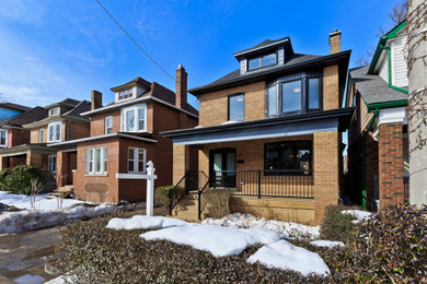 Design ideas for a contemporary house exterior in Toronto.