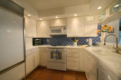 Beach style kitchen photo in Miami