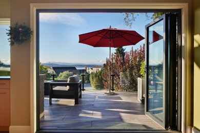 Mid-sized trendy home design photo in Seattle