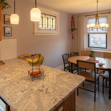 Bathroom/Laundry Room Using Warmer Tones, Accented by New Laundry Facility