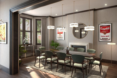Example of a mid-sized trendy dark wood floor, brown floor, wallpaper ceiling and wallpaper enclosed dining room design in London with beige walls, a standard fireplace and a stone fireplace