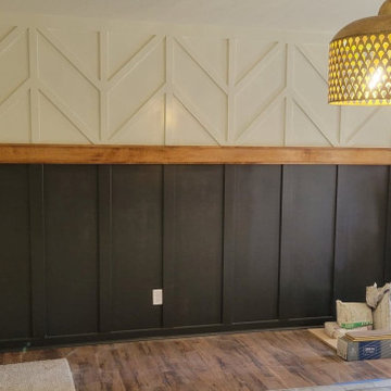 Two-Tone Geometric Accent Wall with Warm Wood Ledge