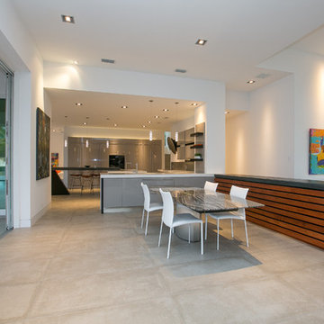 Contemporary Dining Area with Open Kitchen — Bay Isles South Longboat Key