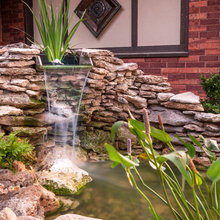 Pergola with Fireplace with Waterfall and Pond
