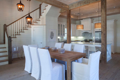 Large minimalist light wood floor and beige floor great room photo in Orlando with white walls and no fireplace