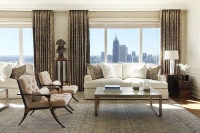 Inspiration for a large transitional formal and enclosed medium tone wood floor living room remodel in Atlanta with beige walls, no fireplace and a concealed tv
