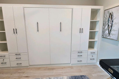 Example of a mid-sized guest bedroom design in Tampa
