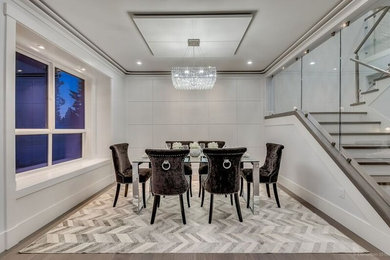 Inspiration for a mid-sized transitional medium tone wood floor great room remodel in Vancouver with gray walls