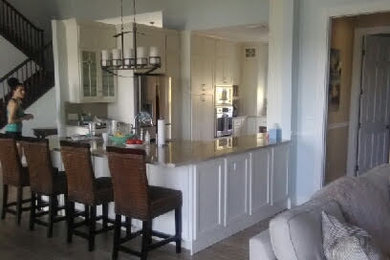 Example of a transitional home design design in Miami