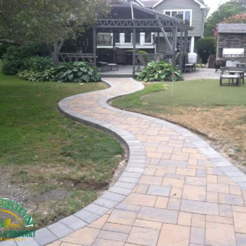 Backyard Patio with Fire Pit & Seating Wall